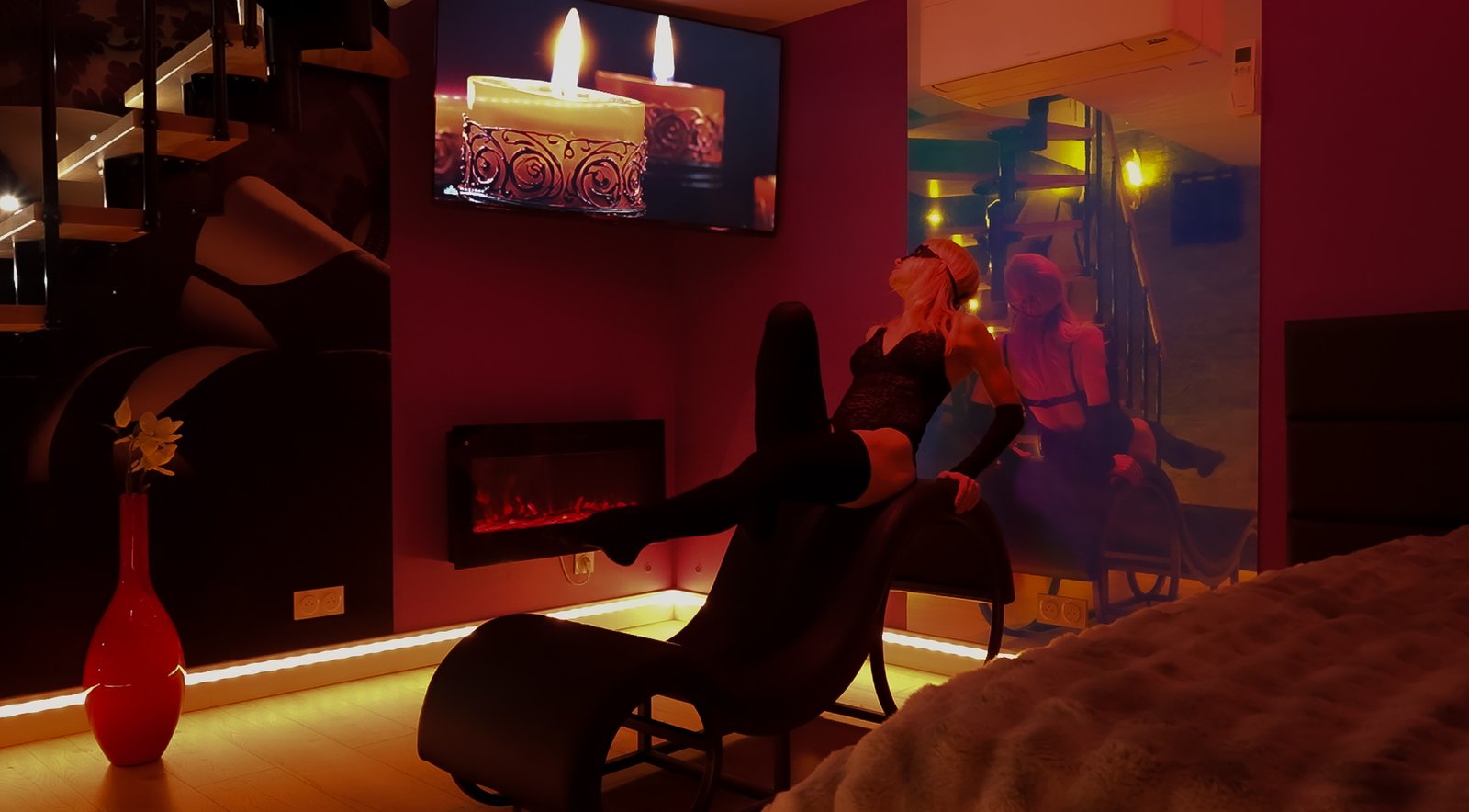 Sofa tantrique — ambiance intime L'Île d'Andromède, expérience couple Paris